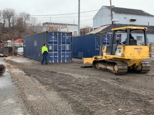 Image of shipping containers at a construction site