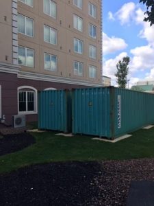 Image of storage containers outside of a hotel in Kearny, New Jersey
